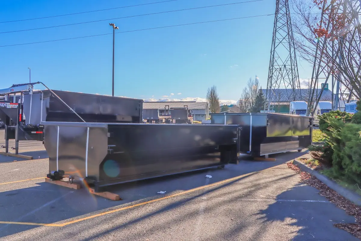 Roll-off dumpster ready for waste disposal at job site for Construction Dumpster Rental in Demarest